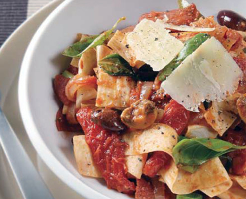 Plate-of-Mountain-Bread-cut-like-pasta-passata-olives-mushrooms-and-basil