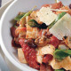 Plate-of-Mountain-Bread-cut-like-pasta-passata-olives-mushrooms-and-basil