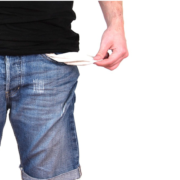 man in jeans torso showing his empty pockets